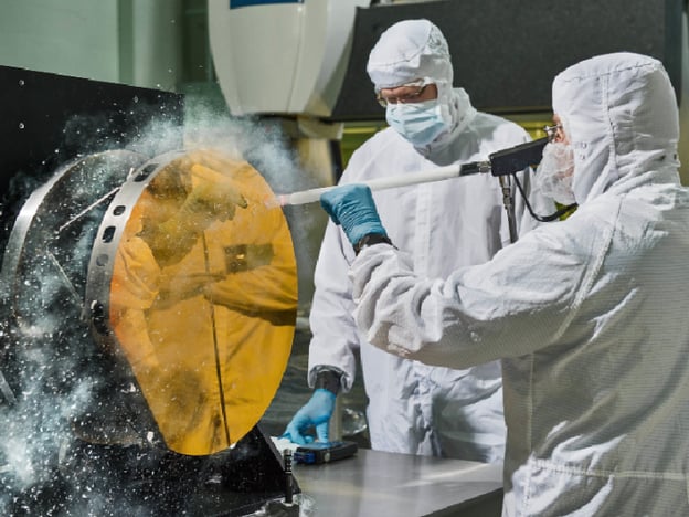 Engineers clean mirror with carbon dioxide snow by NASA Goddard Space Flight Center via Flikr.