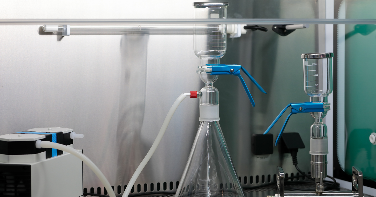 A Buchner funnel with a rubber adapter in a lab.