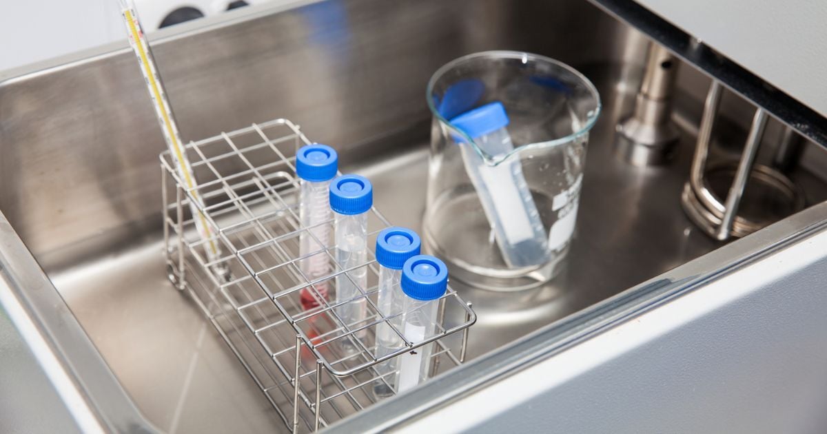 Several glassware in a water bath.