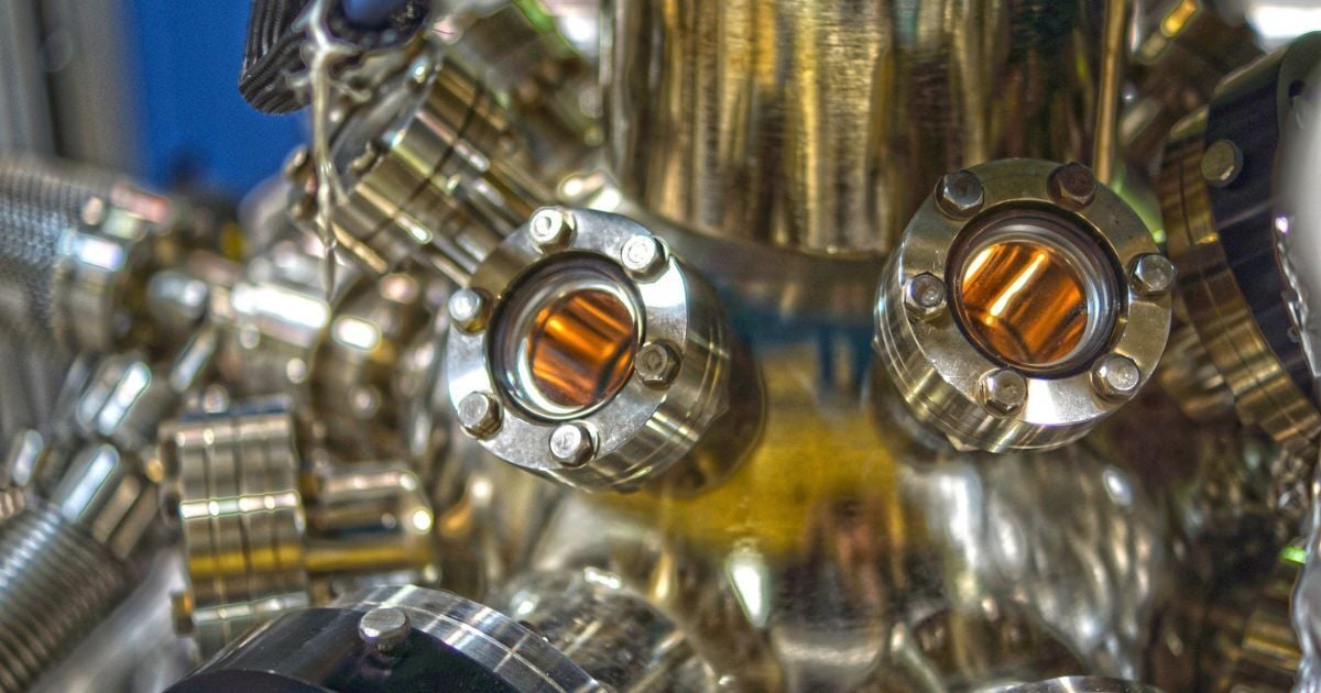 A close up of vacuum equipment in a lab.