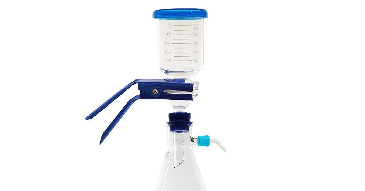 A glass buchner funnel on top of a glass flask.