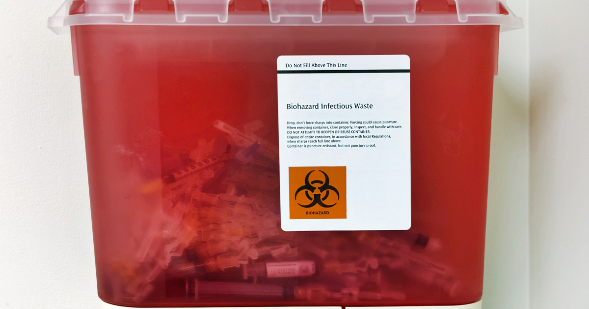 A medical sharps container used to contain biohazard waste.